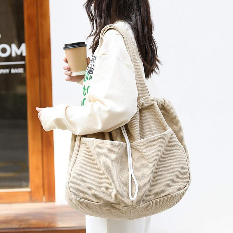Corduroy Multi-Pocket Drawstring Shoulder Bag